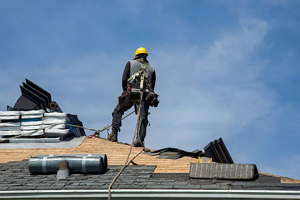 Professional Roofing technician working in Jamaica, NY